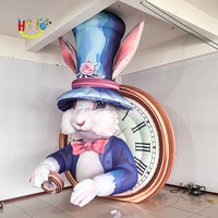 Lapin gonflable de lapin de personnage de dessin animé gonflable de décoration de fête du pays des merveilles avec l'horloge