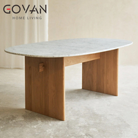 Table à manger ovale de style nordique avec pieds en bois de frêne et plateau en marbre pour usage domestique et commercial, capacité 6 personnes