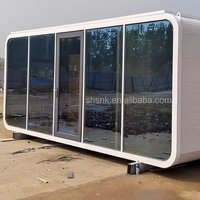 Maison moderne préfabriquée 20 pieds 40 pieds Capsule spatiale Apple Pod Petite maison en conteneur avec cabine Capsule conçue pour la vie urbaine