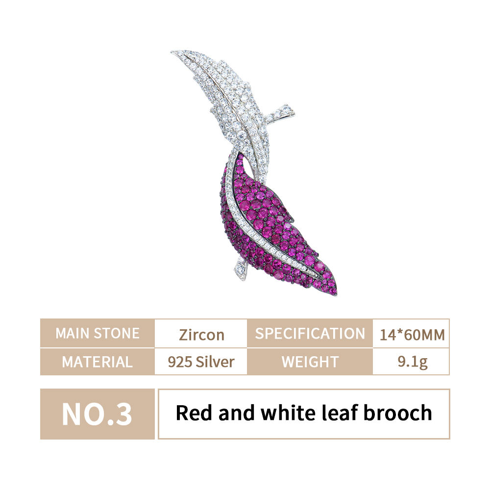 เข็มกลัดใบไม้สีแดงและสีขาว