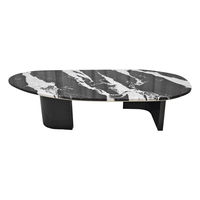 Table basse ovale en marbre noir et blanc avec base en acier inoxydable noir