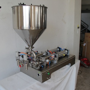 Machine de remplissage semi-automatique à 2 buses pour sachets Doypack de pâte, liquide, jus, et sachets à bec verseur pour sauces épaisses, idéale pour les aliments pour bébés - Product Image 4