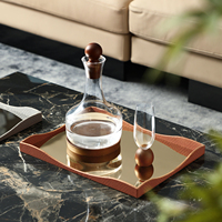 Plateau miroir moderne de luxe élégant en forme de vague, en métal et cuir, multifonctionnel, pour service et organisation de coiffeuse, idéal pour le café
