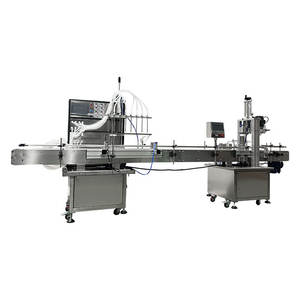 Máquina automática de llenado de líquidos de 8 cabezales con línea de tapado para botellas de leche y jugo, accionada eléctricamente, de alta precisión, 380V - Product Image 1