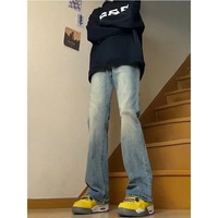 Jean slim en denim pour homme avec détails de coutures apparentes