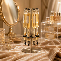 Support rotatif argenté pour distributeur de parfum avec 6 flacons de 375 ml pour présentation et décorations de fête