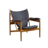 Fauteuil de salon scandinave moderne du milieu du siècle en bois de frêne, fait main, avec accoudoirs sculpturaux en bois courbé et assise en cuir PU capitonnée, idéal pour hôtel