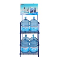 Nouveau produit : Étagère métallique à 2 niveaux pour bouteilles d'eau de 1 gallon, revêtement époxy bleu foncé, pour la vente au détail