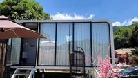 Vente en gros de mini-maisons préfabriquées modulaires colorées de 20 pieds, type Apple Cabin House, pour bureau, maison capsule en aluminium de couleur personnalisée