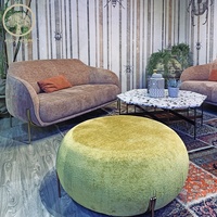 Rembourrage en tissu de haute qualité, repose-pieds courbés et chaise à bille