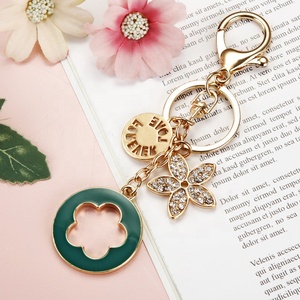 Chất lượng cao Sáng Tạo cá nhân Rhinestone may mắn năm lá cỏ Móc chìa khóa để trang trí - Product Image 3