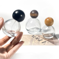 À vendre parfum de luxe atomiseur pompe de pulvérisation ronde de forme sphérique 30ml 50ml 100ml parfum bouteille en verre