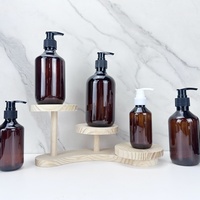 Bouteille en plastique PET transparente ambre verte personnalisée de 100 ml, 150 ml, 200 ml, 300 ml, 500 ml avec pompe pour huile capillaire, shampoing, sérum et lotion pour soins de la peau