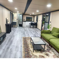 Maison conteneur modulaire préfabriquée pliable à double aile extensible, personnalisée en usine, pour hôtels, bureaux et projets de camps