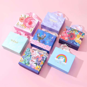 Cajas de regalo rígidas personalizadas con asa, papel artístico rectangular, impresión UV, diseño a cuatro colores para embalaje de regalos de boda y manualidades. - Product Image 1