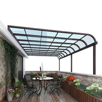 Auvent rétractable motorisé moderne en alliage d'aluminium et acrylique pour terrasse, caravane et patio extérieur