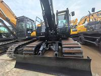 Mini-pelle sur chenilles XE90U à bras articulé court, godet de 0,33 m, garantie 1 an, pour usage en construction
