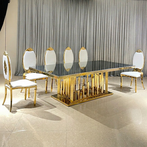 Mesa de Comedor Rectangular de Lujo, Moderna, de Acero Inoxidable Dorado, con 8 Sillas, Personalizada para Uso en Hoteles - Product Image 1