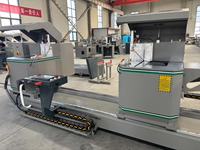Scie à onglet double tête CNC robuste pour profilés de fenêtres en aluminium et PVC/UPVC avec moteur PLC et roulement LJG-CNC-650