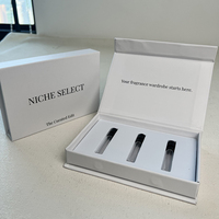 Boîte cadeau magnétique de luxe sur mesure, style livre, en carton rigide, avec plusieurs inserts en EVA