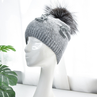 Femme véritable fourrure pompon bonnet chapeaux pour femmes hiver laine tricoté Logo personnalisé bonnet chapeau haute qualité bonnet chapeau pour femmes hiver