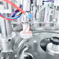 Machine de remplissage automatique pneumatique Wejing pour aérosols, haute précision (1%), haute efficacité, pour produits chimiques, cosmétiques, huiles et gaz