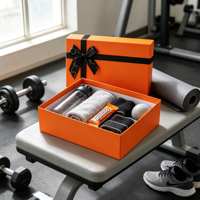 Coffret Cadeau Fitness Orange avec Bouteille d'Eau, Serviette, Barre de Snacks, Poids de Poignet, Ballon de Massage, Emballage de Gym, Ensemble Cadeau en Gros