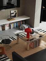 Table basse compacte en métal de style nordique mi-siècle avec plateau en verre trempé miroir et piètement en acier inoxydable, idéale pour salon moderne ou petit espace.