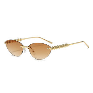 Nouvelle mode lunettes de soleil œil de chat pour hommes femmes Internet célébrités Style Orange cadre Tac métal Rivet jambe lunettes de soleil sans cadre - Product Image 6