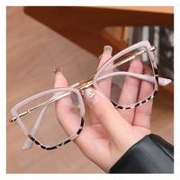 Lunettes de vue photochromiques œil de chat en métal pour femmes 2025, anti-lumière bleue, monture optique classique, haute qualité, tendance