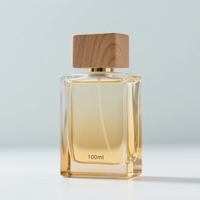 Flacon de parfum en verre de luxe personnalisé de 50 ml, à fond épais, avec dégradé doré, bouchon à bille et boîte diffuseur à bâtonnets