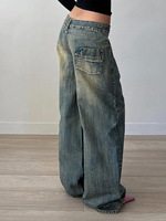 Jean large vintage délavé en denim déchiré avec double bouton et poches plaquées, coupe décontractée ample et décontractée