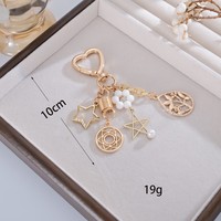 Porte-clés Cœur Doré avec Fermoir, Perles de Cristal, Pendentif Métal Creux, Breloque de Sac, Étoile, Lune, Nœud, Symbole Dollar, Anneau de Clés pour Sac à Main, Cadeau pour Femme