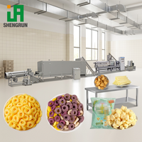 Ligne de production de snacks de riz remplis par extrudeuse bivis, avec expansion réglable, adaptée au remplissage liquide-solide, pour snacks multigrains