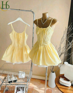 Yellow Woven <b>Spaghetti</b> <b>Strap</b> Bow Bust Mini Dress Vietnam Line Dress Sweet Feminine Bow Tie Front Bust Cup Design - Product Image 1