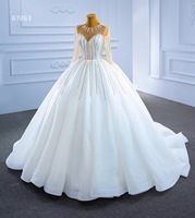Feishiluo robe de mariée de luxe pour femmes robe de bal ivoire en gros avec manches longues paillettes et décorations florales en organza