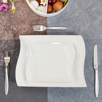 Service de table en porcelaine blanche de luxe à succès pour les hôtels, vaisselle de table d'angle sans fin, assiette en céramique, vaisselle