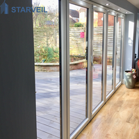 Porte patio pliante pour terrasse d'appartement, en aluminium, double vitrage, design gain de place, système de panneaux isolants à double vitrage