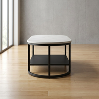 Table basse ovale moderne en marbre blanc avec rangement à double niveau et structure en métal noir pour salon d'entreprise
