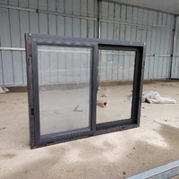 Fenêtre de ventilation coulissante verticale antivol en alliage d'aluminium intégré pour entrepôt et maison conteneur