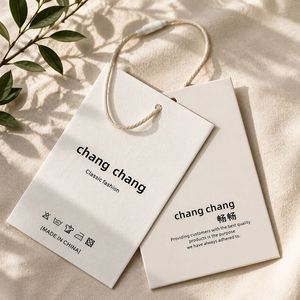 Étiquettes suspendues personnalisées pour vêtements en papier écologique avec logo de marque, étiquettes de prix pour sacs et vêtements - Product Image 1