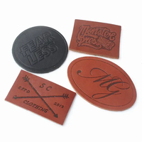 Prix d'usine en gros Logo de marque personnalisé en relief en cuir véritable mode Jeans Badge étiquettes patchs