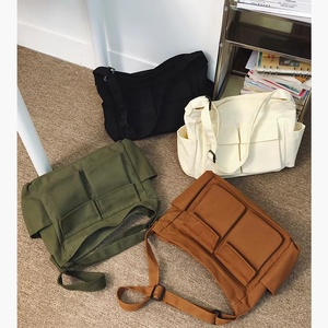 Grand sac à bandoulière en toile unisexe multi-poches fourre-tout à la mode avec fermeture éclair pour hommes et femmes - Product Image 1