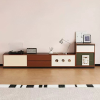 Meuble TV de style Mid-Century, armoire sans poignée à blocs de couleur avec décor rond évidé, tiroirs mixtes et rangement fermé pour appareils multimédias