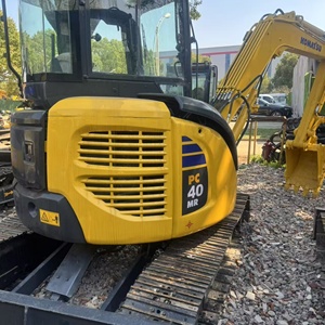 Mini-excavatrice sur chenilles Komatsu PC40MR d'occasion, jaune, diesel, 4 tonnes, équipement de construction avec roulement - Product Image 1
