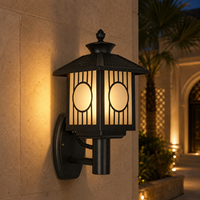 Lanterne murale décorative d'extérieur avec cadre ovale pour l'éclairage des jardins de villas