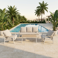 Ensemble de mobilier d'extérieur 4 pièces pour terrasse de appartement, en rotin PP, canapé de conversation moderne, cadre blanc, accoudoirs effet bois