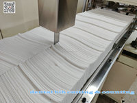Machine automatique pour la fabrication de bavoirs dentaires, appareil commercial