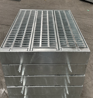 Couvercle de trou d'homme de drainage en acier galvanisé pour véhicules à usage intensif et grille de route avec charnière ouverte pour couvercle de vidange