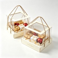 Boîte cadeau de Noël transparente en gros, vente chaude, boîte cadeau de Noël personnalisée avec poignée, emballage pour bonbons et foulards en encre de soja